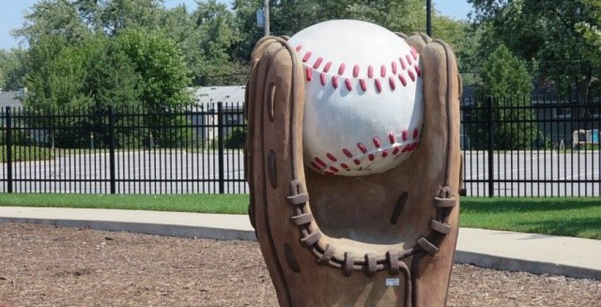 catchy business name idea featured statue of a baseball mit catching a baseball